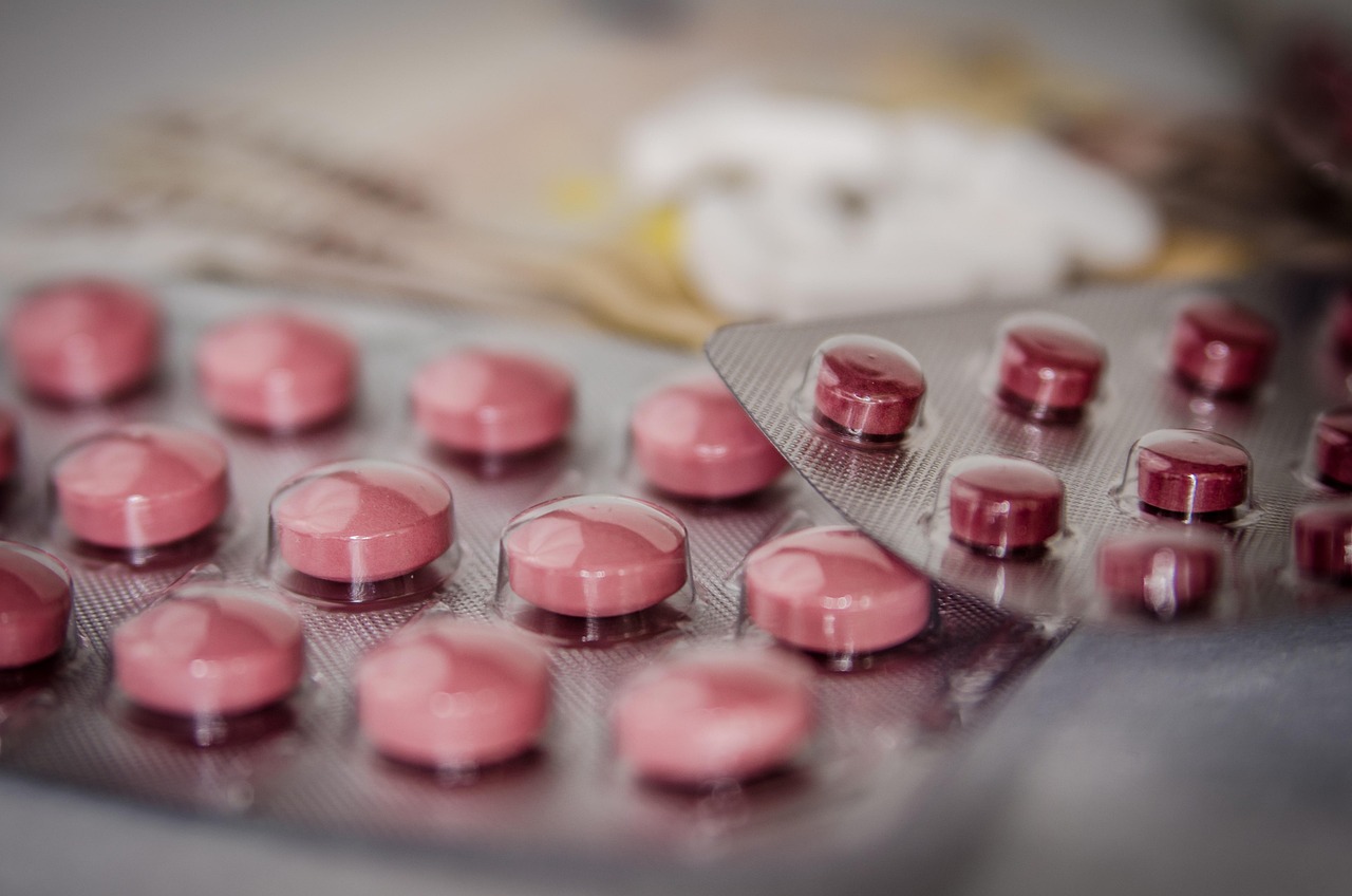 A pharmacist organizing adherence blister packaging