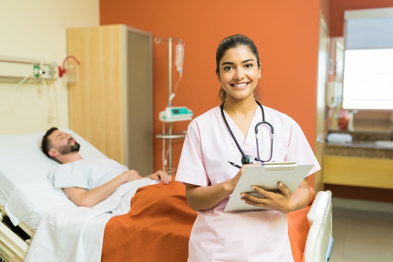 A nurse reviewing a discharge plan with an elderly resident
